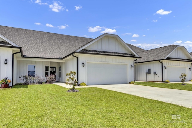 9983 Willet Way, Foley, AL 36535 - modern inspired farmhouse featuring board and batten siding, an attached garage, roof with shingles, concrete driveway, and a front yard