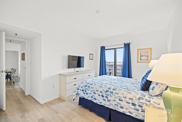 bedroom featuring light wood-type flooring