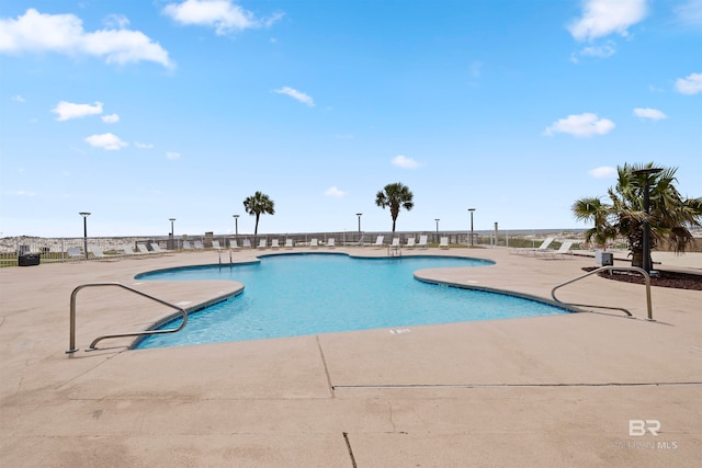 view of pool with a patio