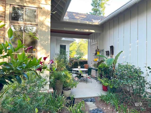 doorway to property with a patio area