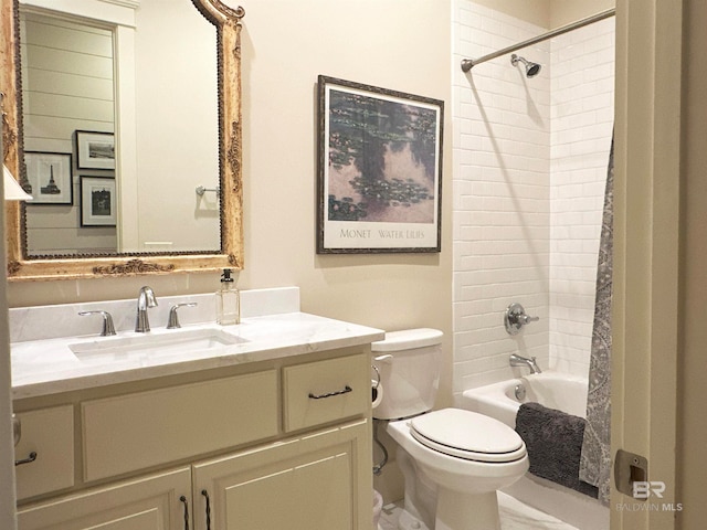 full bathroom with vanity, toilet, and shower / bath combo with shower curtain