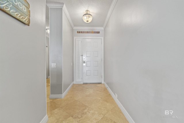 doorway to outside with an inviting chandelier, baseboards, ornamental molding, and a textured ceiling