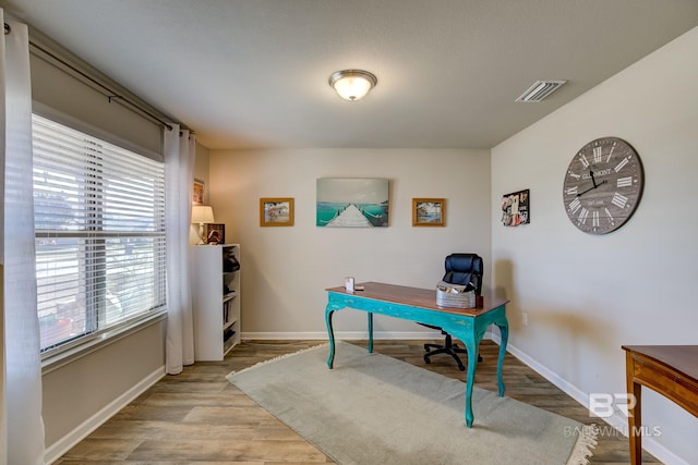 office space featuring light hardwood / wood-style floors