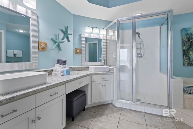 25250 Perdido Beach Blvd Unit 304E, Orange Beach, AL 36561 - full bathroom featuring tile patterned flooring, a stall shower, and vanity