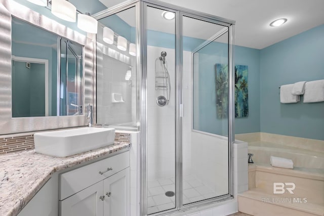 25250 Perdido Beach Blvd Unit 304E, Orange Beach, AL 36561 - full bath with a garden tub, vanity, and a shower stall