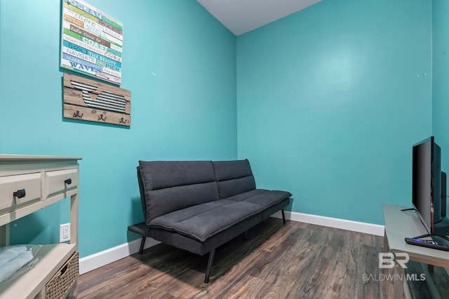 25250 Perdido Beach Blvd Unit 304E, Orange Beach, AL 36561 - sitting room featuring dark wood finished floors and baseboards