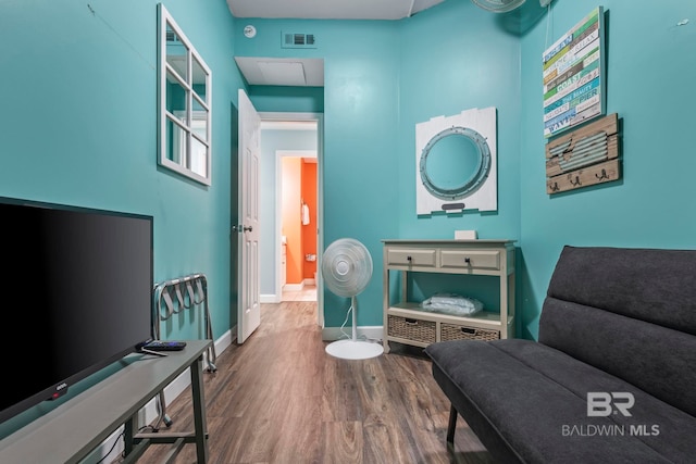 25250 Perdido Beach Blvd Unit 304E, Orange Beach, AL 36561 - living area featuring wood finished floors, visible vents, and baseboards