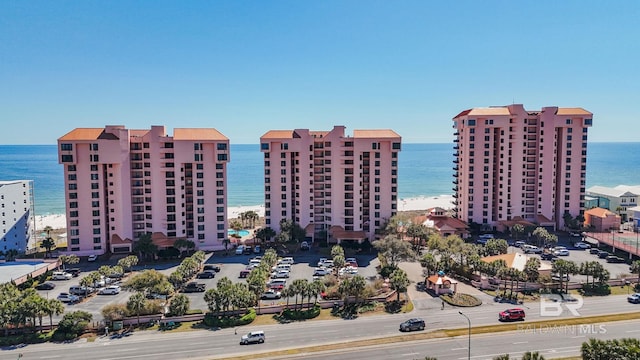 25250 Perdido Beach Blvd Unit 304E, Orange Beach, AL 36561 - view of building exterior with a view of city and a water view