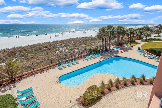 25250 Perdido Beach Blvd Unit 304E, Orange Beach, AL 36561 - pool with a patio area, a water view, and fence