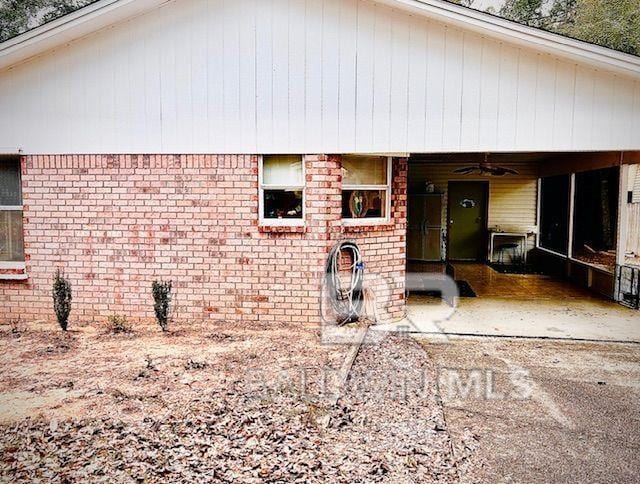 back of house featuring ceiling fan