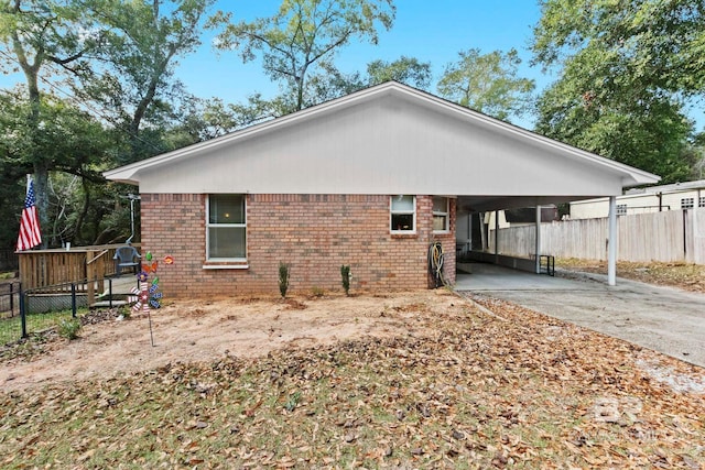 view of home's exterior with a carport