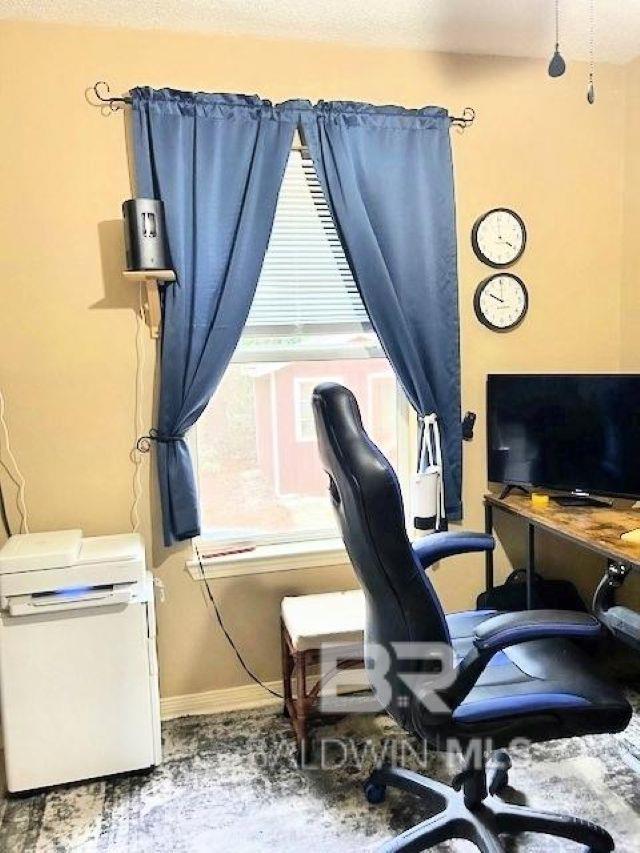 office area featuring a textured ceiling