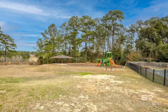 view of yard featuring a gazebo and a playground