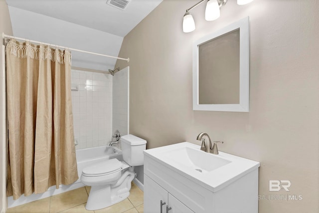 full bathroom featuring lofted ceiling, tile patterned flooring, vanity, toilet, and shower / bath combo