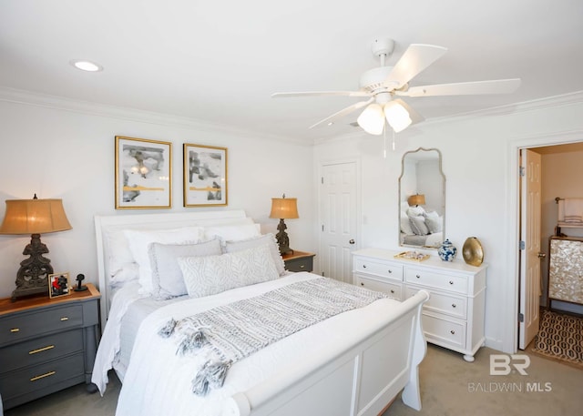 bedroom featuring a ceiling fan, recessed lighting, light colored carpet, and crown molding