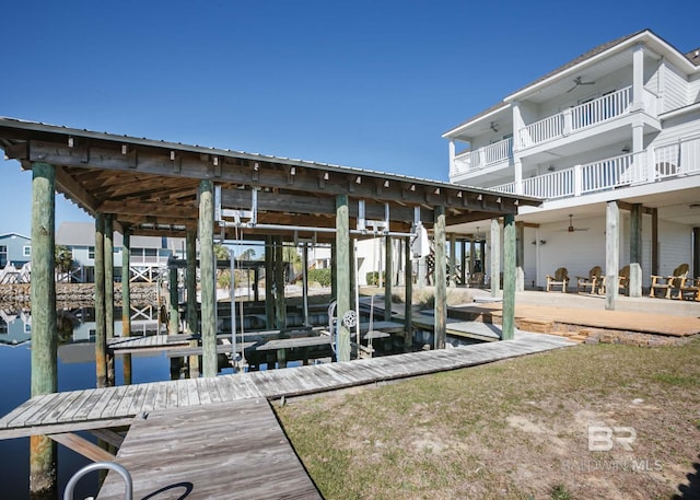 view of dock with boat lift