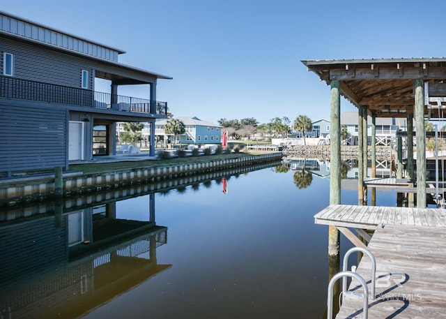 dock area with a water view