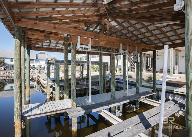 view of dock featuring boat lift
