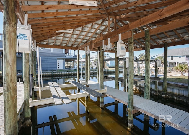 dock area featuring a water view