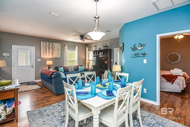 dining area featuring ceiling fan and hardwood / wood-style flooring