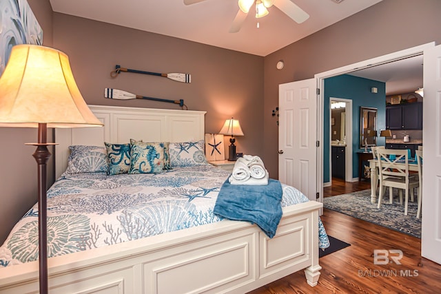 bedroom featuring ceiling fan and dark hardwood / wood-style floors