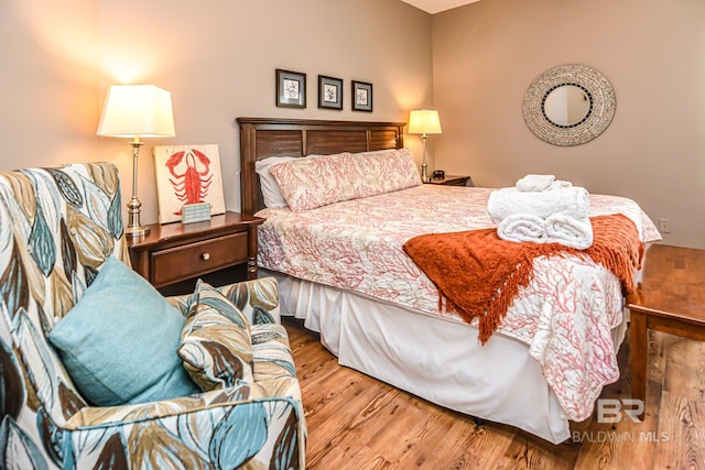 bedroom featuring hardwood / wood-style flooring