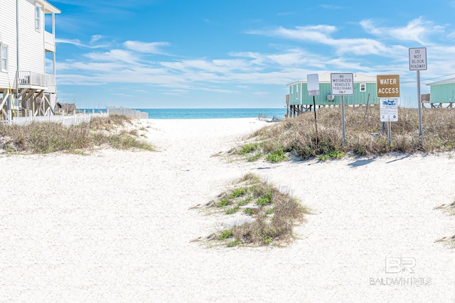 property view of water featuring a beach view