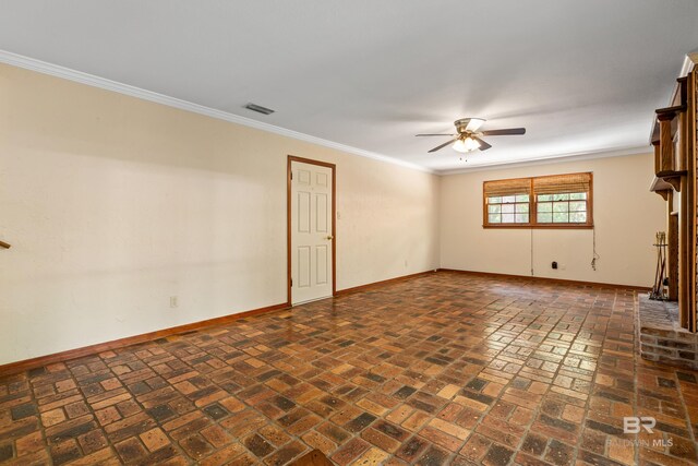 606 Fairhope Ave, Fairhope, AL 36532 - unfurnished living room featuring baseboards, a ceiling fan, brick floors, and crown molding