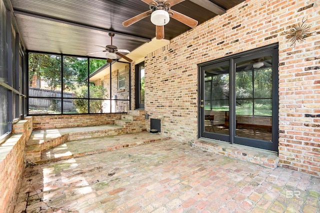 606 Fairhope Ave, Fairhope, AL 36532 - unfurnished sunroom with a ceiling fan and beam ceiling