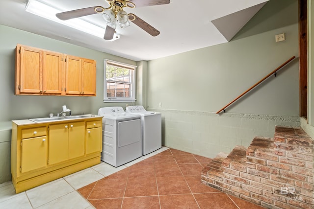 606 Fairhope Ave, Fairhope, AL 36532 - washroom featuring cabinet space, washer and dryer, a ceiling fan, and light tile patterned flooring