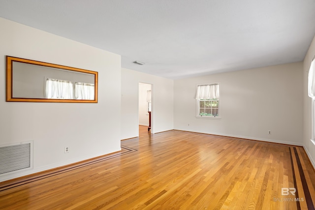 606 Fairhope Ave, Fairhope, AL 36532 - unfurnished room with light wood-type flooring and baseboards