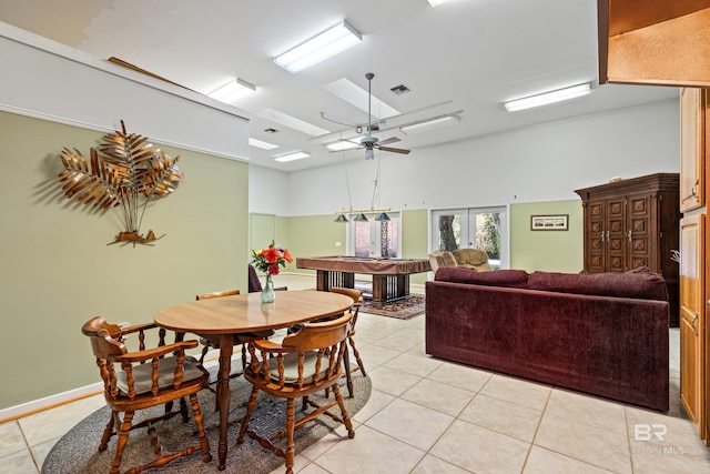 606 Fairhope Ave, Fairhope, AL 36532 - dining area with light tile patterned floors, a high ceiling, french doors, and ceiling fan