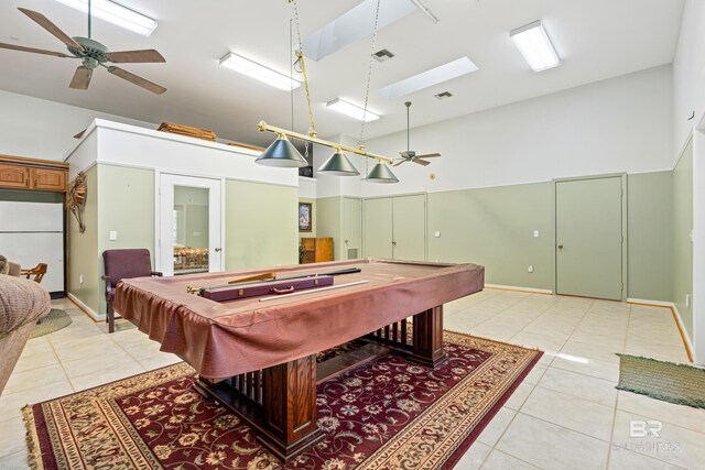 606 Fairhope Ave, Fairhope, AL 36532 - game room with billiards, ceiling fan, light tile patterned floors, a high ceiling, and a skylight