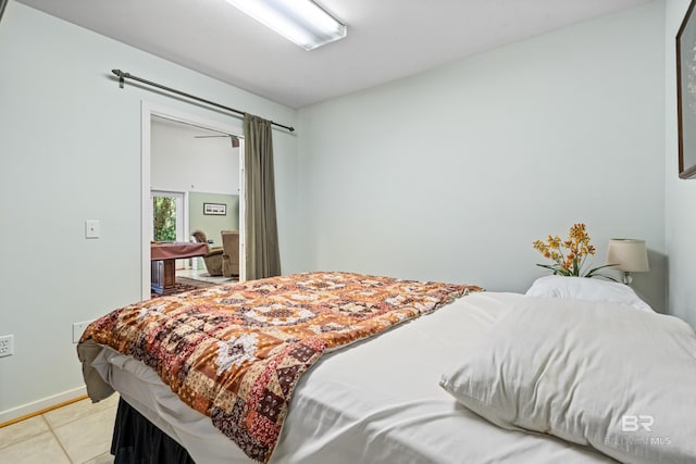 606 Fairhope Ave, Fairhope, AL 36532 - bedroom with light tile patterned flooring and baseboards