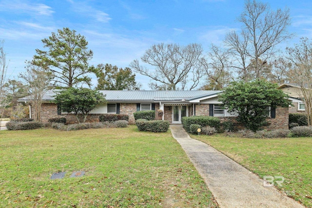 ranch-style home featuring a front yard