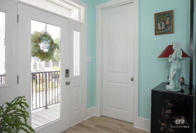 entrance foyer with light wood-style flooring