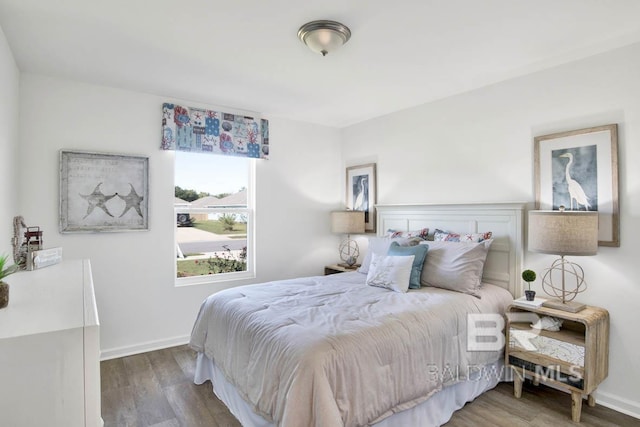 bedroom featuring hardwood / wood-style flooring