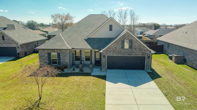 view of front of property featuring a front lawn, a porch, concrete driveway, and brick siding