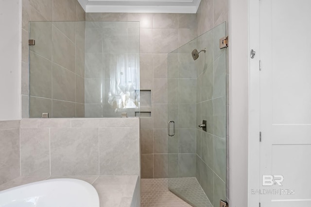 bathroom featuring plus walk in shower