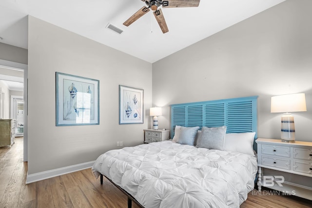 bedroom with light wood-type flooring and ceiling fan