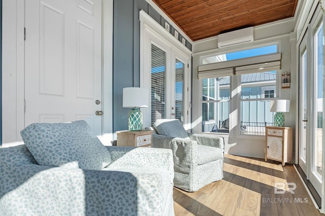 sunroom / solarium featuring wooden ceiling and a wall unit AC