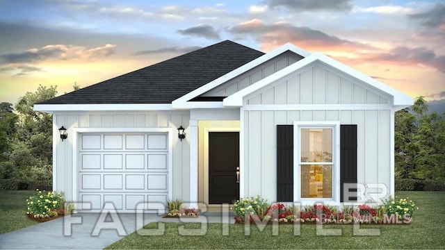 13690 Logan Pl, Foley, AL 36535 - view of front of house with board and batten siding, roof with shingles, a yard, concrete driveway, and a garage