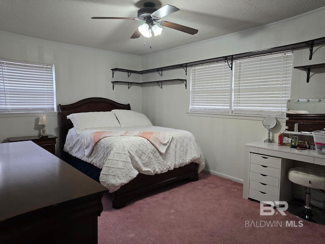 bedroom with ceiling fan, a textured ceiling, light carpet, and multiple windows