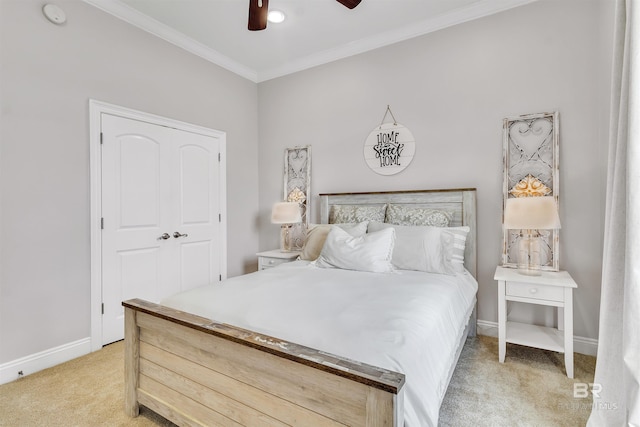 bedroom featuring light carpet, crown molding, baseboards, and ceiling fan