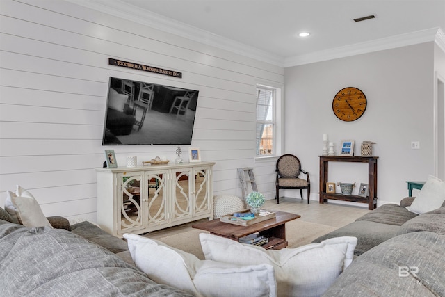 living room with ornamental molding, recessed lighting, visible vents, and wood finished floors