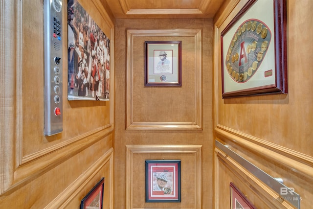 room details featuring elevator and crown molding