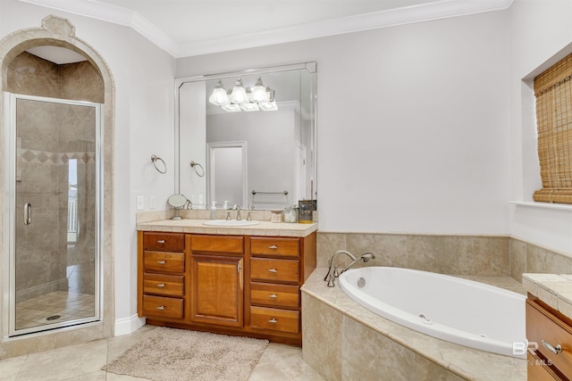 bathroom with ornamental molding, a stall shower, vanity, a bath, and tile patterned floors