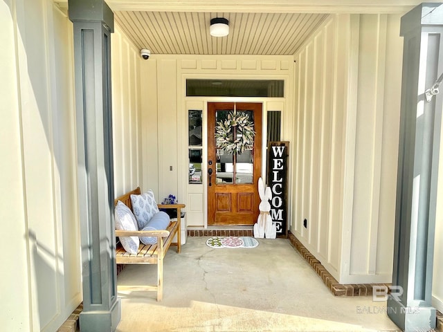 doorway to property featuring a porch