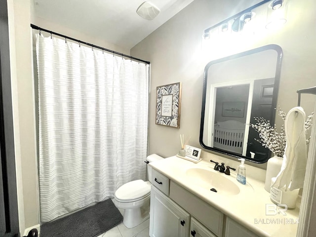 bathroom with tile patterned flooring, a shower with shower curtain, toilet, and vanity