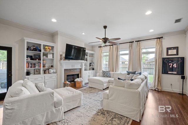 13713 Kearny Dr, Loxley, AL 36551 - living area featuring crown molding, a ceiling fan, recessed lighting, a high end fireplace, and baseboards
